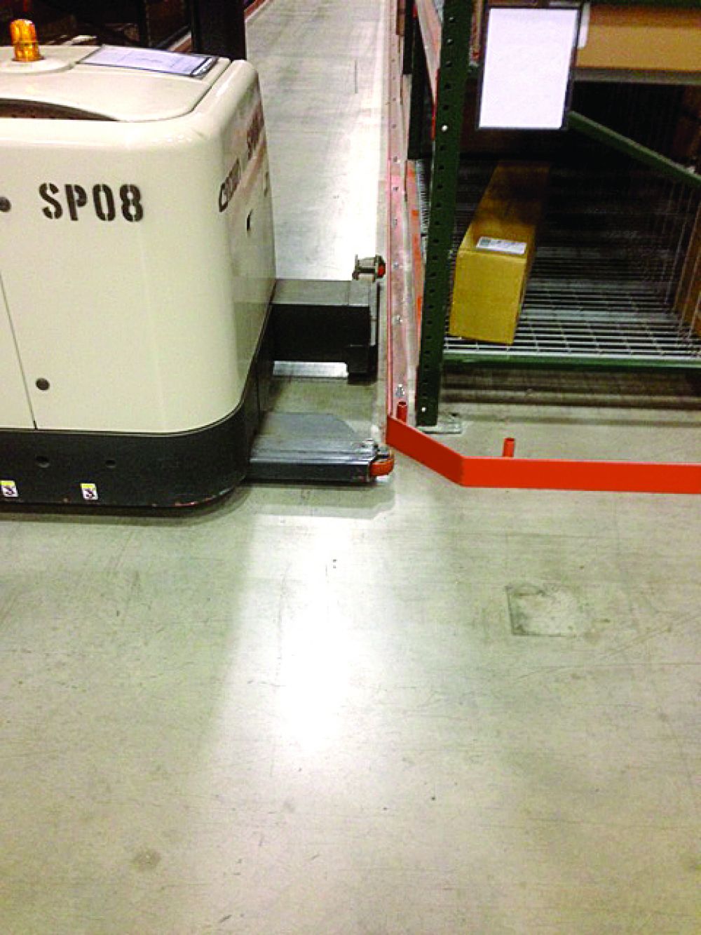 Floor mounted guards protect pallet rack systems